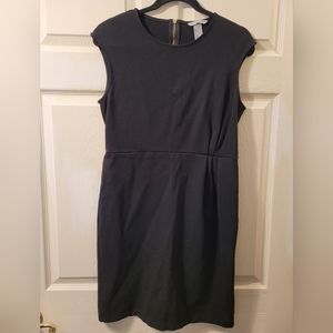 H&M solid black dress with gold zipper on back size M